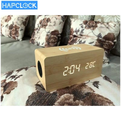 Hot sale Mobile phone wireless charging clock, Bluetooth speaker desktop wooden LED alarm clocks with temperature display